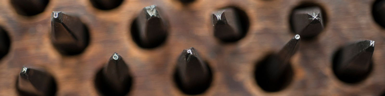 Close up picture of letter punches in the Royal Mint Museum Collection