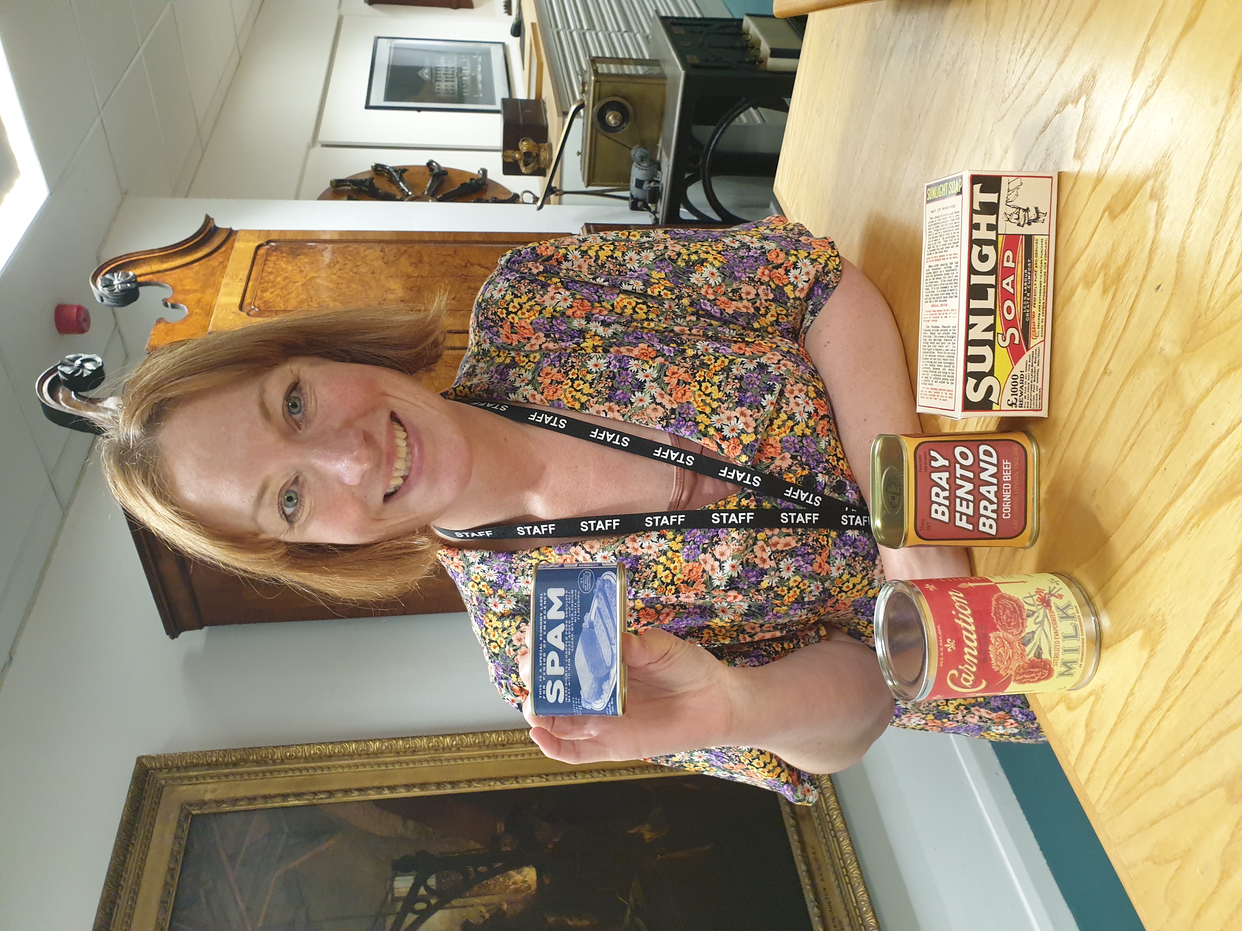 Our Education Manager with replica tins for the new workshop