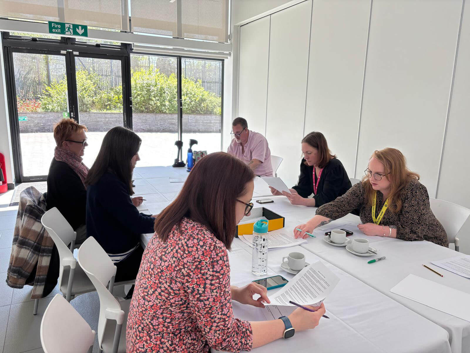 Royal Mint Museum staff reading stories in the Royal Mint Experience
