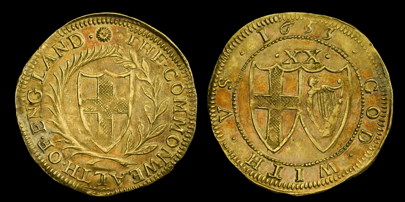 A gold commonwealth coin. Featuring simple designs of shields and inscriptions in English